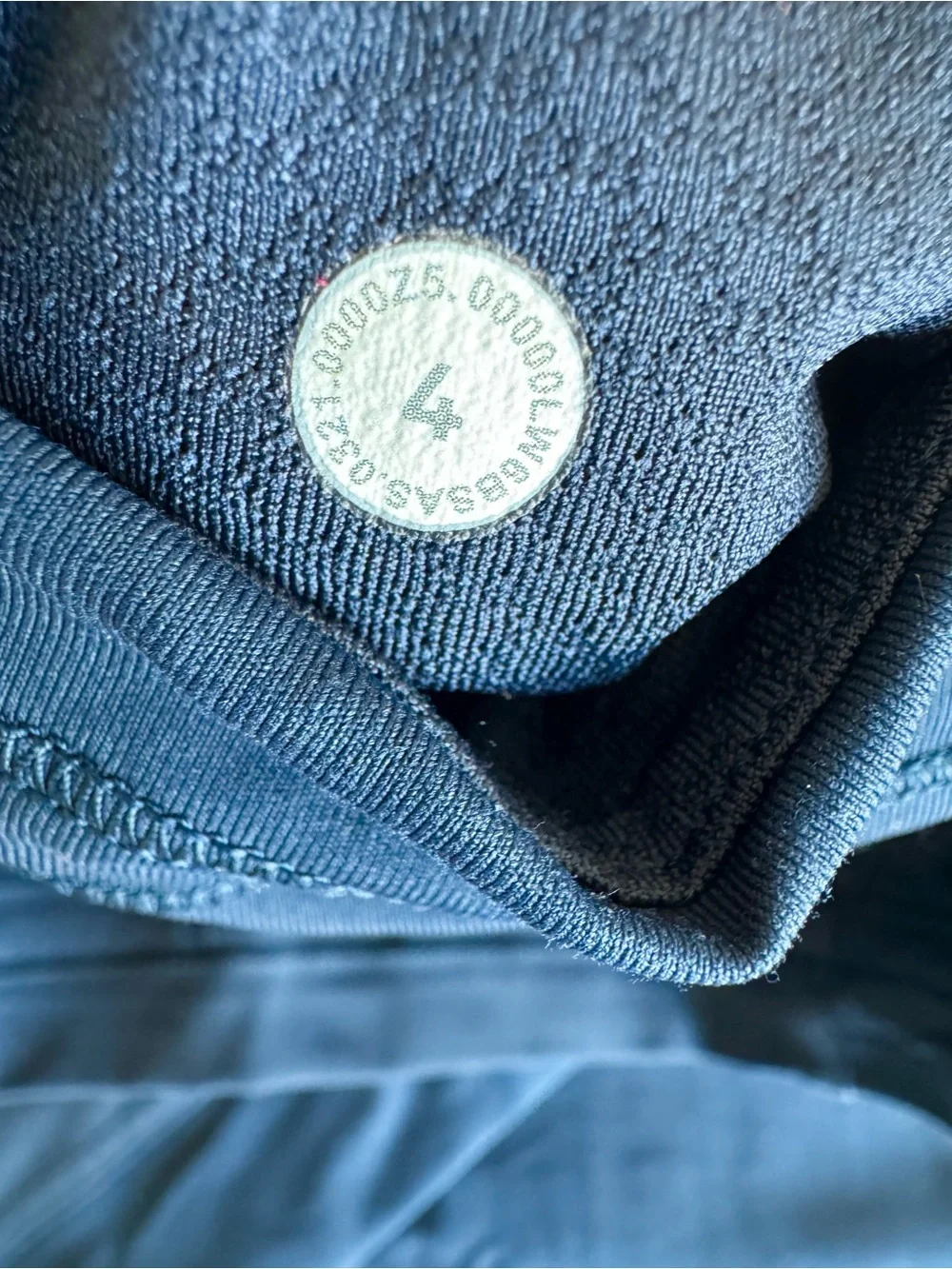 Lululemon performance leggings in a dark navy blue with Side Pockets